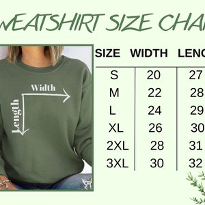 May include: A sweatshirt size chart with measurements in inches. The chart includes sizes S to 3XL, with corresponding width and length measurements. The image also shows a person wearing a green sweatshirt, with arrows indicating width and length.