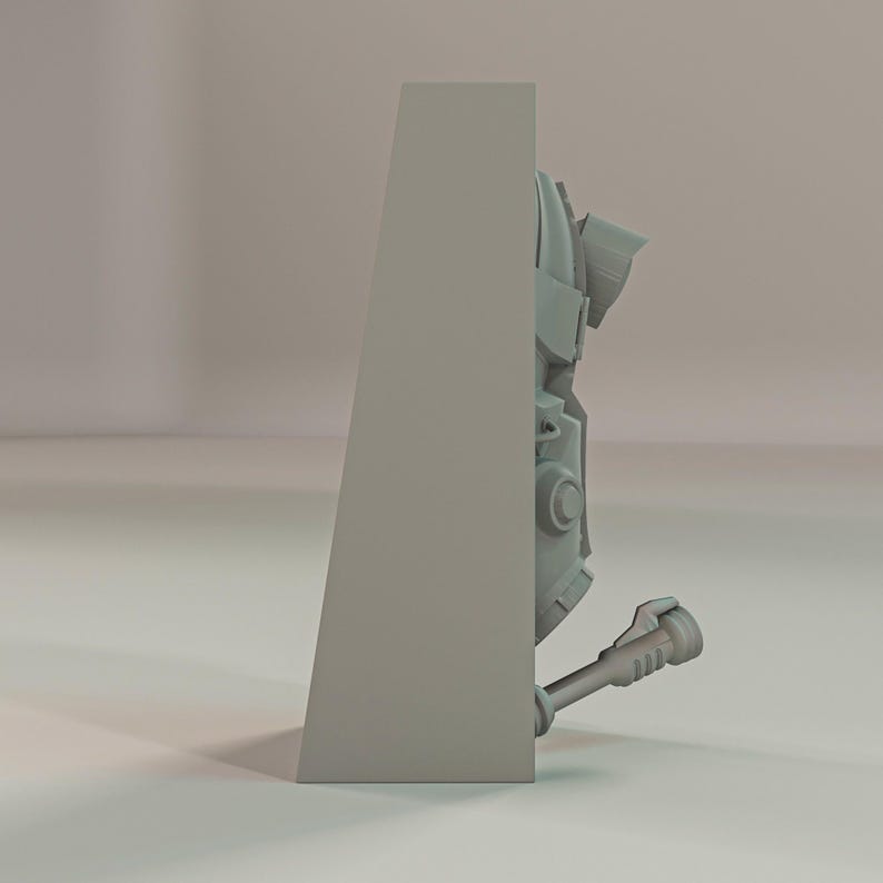 May include: A light gray, 3D-rendered model of a mechanical object, partially obscured by a gray triangular structure. The object has a complex, angular design with cylindrical and rectangular components. The overall aesthetic suggests a futuristic or industrial theme.