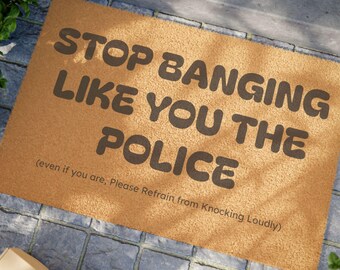 The "Knock Quietly" Funny Welcome Mat