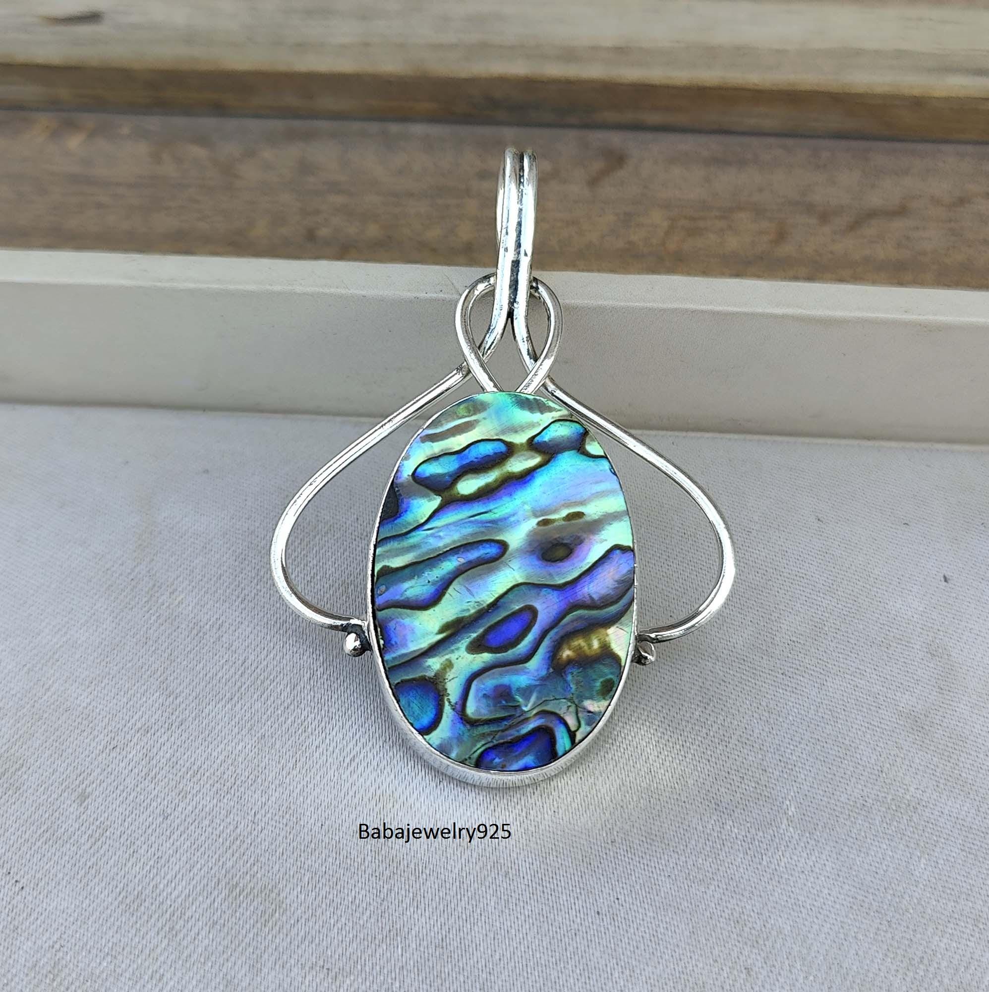 BROCHE SUPERBE EN NACRE ABALONE OVALE