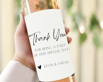 May include: A white wine bottle with a printable label that says "Thank You for being a part of our special day! Kevin & Sarah".