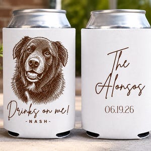May include: Two white foam can coolers featuring a brown line-art illustration of a dog. The left cooler displays the text "Drinks on me!" and "NASH". The right cooler features the text "The Alonsos" in script and the date "06.19.26" below it.