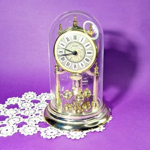Vintage Decorative Table Clock Retro Gold Clock with Spinning Globes and Plastic Dome Vintage Gold Table Clock Vintage Gold Clock with Dome