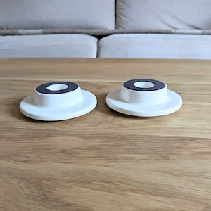 A pair of Arabia Finland candle holders