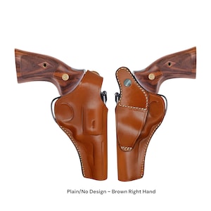 May include: Two brown leather holsters for a right-handed user are shown against a white backdrop. The holsters are plain, with no design, and have visible stitching. The text "Plain/No Design ~ Brown Right Hand" is at the bottom of the image.