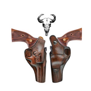 May include: Two brown leather holsters with a decorative bull skull emblem, alongside two revolvers with wood grain handles. A black and white bull skull graphic is centered above the holsters.
