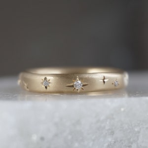 Starry Engrave Band,  18k diamond Gold Ring,  Handmade Texture Band, Hand Engrave Ring , Simple Wedding Ring, Eternity Ring  9 ct Gold, 14k Yellow Gold Diamond Ring,  Diamond Band, Handmade Engagement Ring, Stacking Ring, Matte finishing, Glossy  finishin, Ring for her, 
Anniversary Ring, Alternative wedding ring, Minimalist Ring, Hammer texture ring, Everyday gold ring, Star ring, Solid gold ring, Dainty , modern low profile ring , Timeless ring, Rustic Ring, one of a kind ring