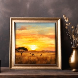 May include: A framed painting of a sunset over a savanna with two giraffes in the foreground. The painting is in a gold frame and is hanging on a brown wall.