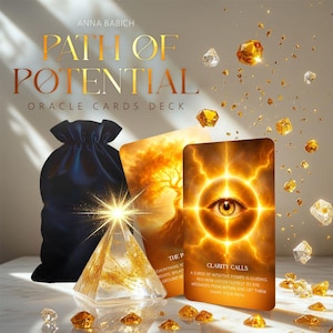 May include: An oracle cards deck titled "Path of Potential" by Anna Babich. The image features a black velvet bag, a clear pyramid, and several oracle cards with golden and orange hues. The cards have text and illustrations.