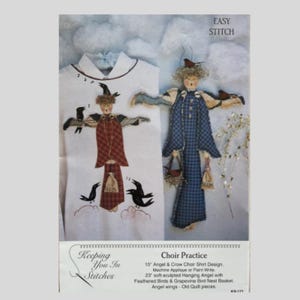 May include: A craft pattern titled "Choir Practice" featuring two angel figures with crow accents. The design includes a shirt design and a hanging angel, with text that reads "Keeping You In Stitches". The pattern includes instructions for machine applique and soft sculpting.
