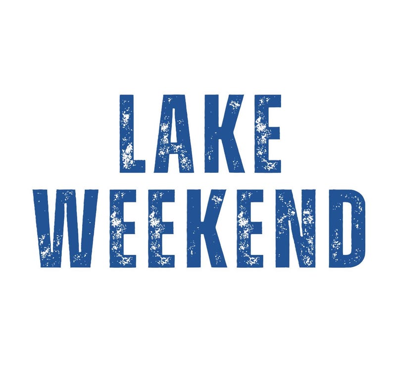 May include: White background with the words "LAKE WEEKEND" in distressed blue font. The text is centered and takes up most of the image, suggesting a theme related to lake activities or a weekend getaway.