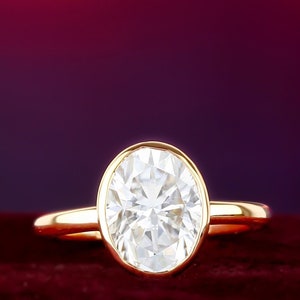 2 CT Oval Moissanite Engagement Ring: 14K Yellow Gold Bezel Set