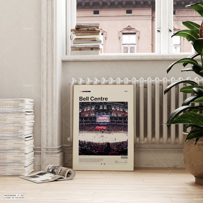 May include: A framed poster featuring the Bell Centre, with the text "Bell Centre" at the top. The image inside shows a hockey game in progress, with a crowd of spectators. The poster includes the text "Montreal, QC" and the year "1996".