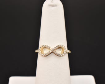 Anello infinito in oro 14 carati con diamanti