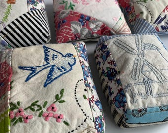Handmade pincushions from vintage needlework and embroidery