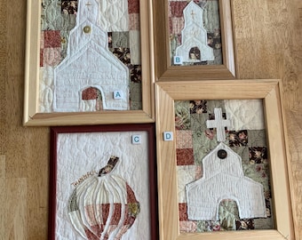 Framed quilted churches made from vintage quilts