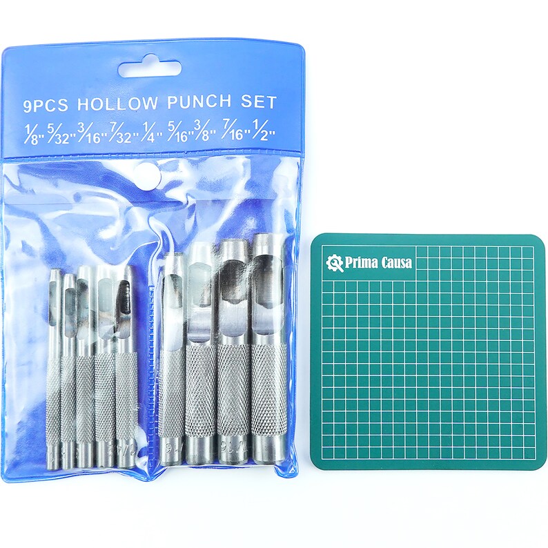 May include: A set of nine hollow punches in a clear plastic bag with a blue header that reads "9PCS HOLLOW PUNCH SET 1/8" 5/32" 3/16" 7/32" 1/4" 5/16" 7/16" 1/2" ". The punches are arranged in order of size, with the smallest punch on the left and the largest punch on the right. A green cutting mat with the text "Prima Causa" is to the right of the punches.