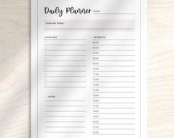 May include: A white daily planner with the text "Daily Planner" at the top. The planner includes sections for goals, to-do lists, and a schedule from 5:00 AM to 10:00 PM. The bottom right corner has the text "NEEM DIGITAL DESIGNS".