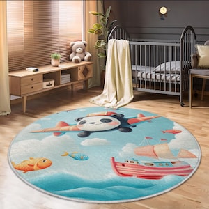 Bonita alfombra infantil con diseño de panda y avión: base tejida antideslizante y suave para decorar la habitación de tu bebé.