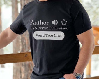 May include: Black t-shirt with white text that reads "Author SYNONYM FOR author: Word Taco Chef" with a speaker and star icon.