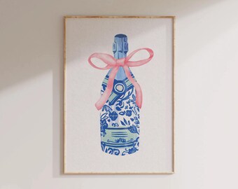 May include: A blue and white patterned champagne bottle with a pink ribbon tied around the neck. The bottle is in a gold frame.