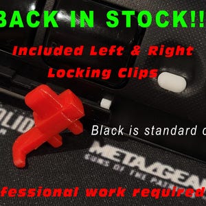 May include: A red locking clip is shown next to a black object. The text "BACK IN STOCK!!!" is in green, and "Included Left & Right Locking Clips" is in red. The text "Black is standard color" is also visible.