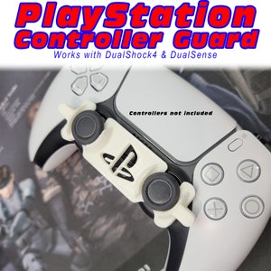 May include: White PlayStation controller guard with black thumbstick covers. The guard is designed to protect the controller from damage. The text "PlayStation Controller Guard" and "Works with DualShock4 & DualSense" is printed on the image. The text "Controllers not included" is printed on the controller.