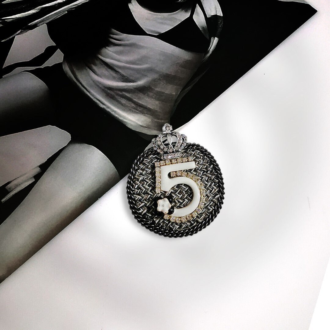 Timeless and Versatile: The Chanel Brooch