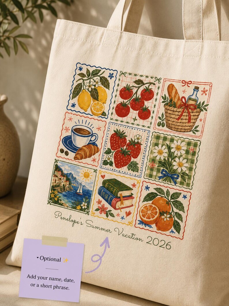 May include: A cream-colored canvas tote bag featuring a grid of nine colorful illustrations including lemons, tomatoes, a picnic basket, coffee, strawberries, daisies, a coastal landscape, books, and oranges, with the text Penelope's Summer Vacation 2026.
