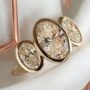 Three-Stone Oval Cut Moissanite Diamond Ring in 14k Yellow Gold Perfect for Engagements Weddings Anniversary Gifts