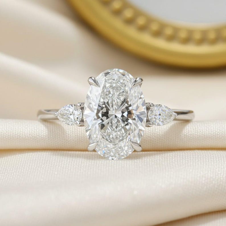 2ct Oval Cut Moissanite Three Stone Ring With Pear Side Stones 14k ...