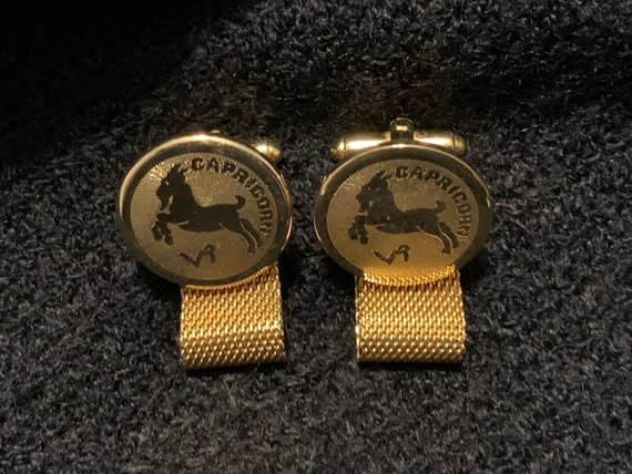 Capricorn gold tone mesh wraparound cufflinks mar… - image 1