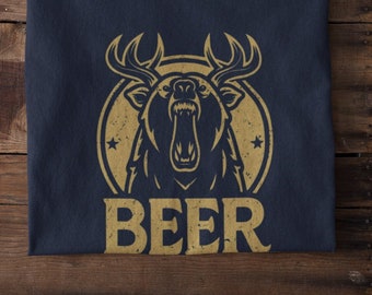 May include: A navy blue t-shirt with a distressed gold graphic of a bear with antlers and the word "BEER" underneath.