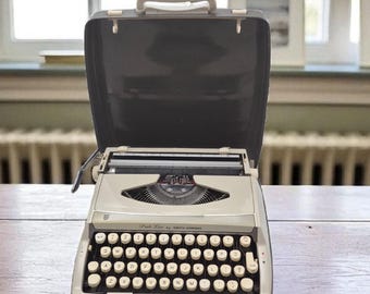 Máquina de escribir portátil Smith Corona Pride Line, años 60 y 70
