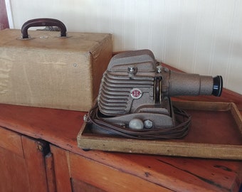 Vintage Manumatic Slide Projector with Case, circa 1950s.