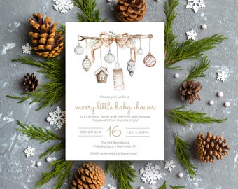 May include: A white rectangular baby shower invitation card featuring a watercolour illustration of a branch with a bow, hanging ornaments, a gingerbread house, and a baby bottle. The text reads: Please join us for a merry little baby shower.