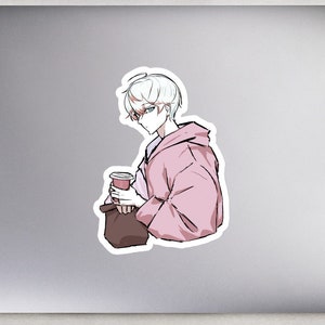 May include: A sticker featuring a cartoon illustration of a person with white hair, wearing a pink hoodie and glasses, holding a cup of coffee and a brown bag.