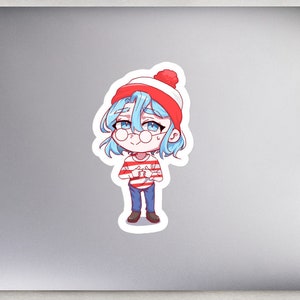 May include: A cartoon sticker of a person with blue hair wearing a red and white striped shirt, red and white hat, and glasses. The person is smiling.