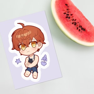 May include: A sticker featuring a cartoon illustration of a person with brown hair wearing a blue swimsuit. The person is smiling and has yellow eyes. The sticker is on a light purple background with a small blue star and a blue rocket.