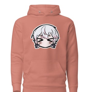May include: A coral pink hoodie with a cartoon illustration of a white-haired character with closed eyes and a small smile. The character has black eyes and is wearing a black shirt.