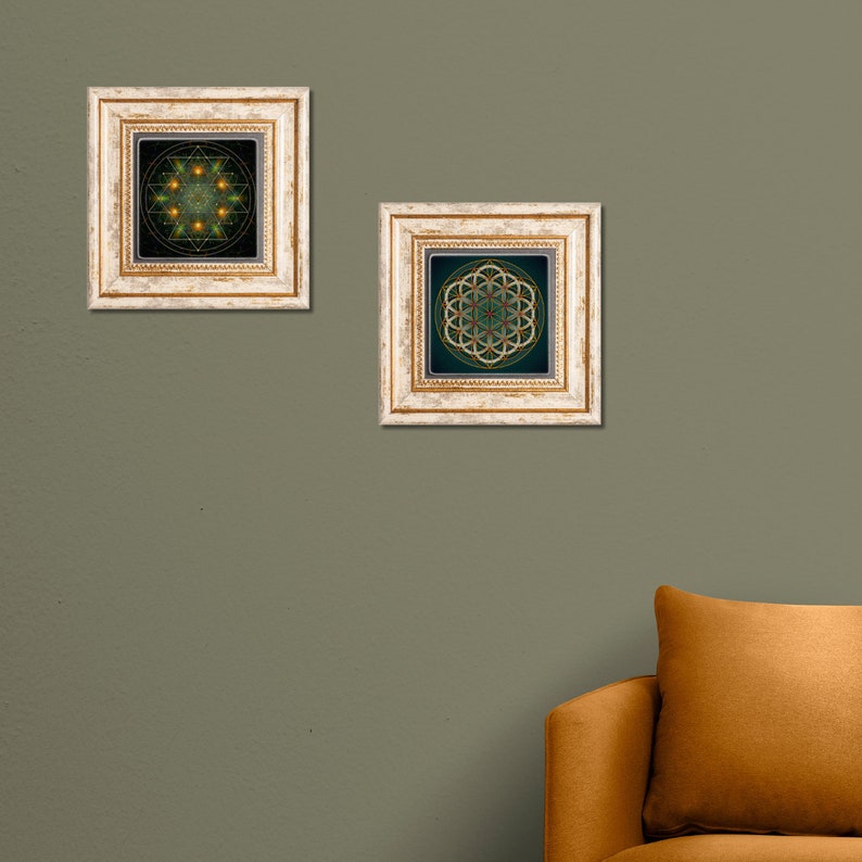 May include: Two framed prints with geometric designs in shades of green, gold, and black. The frames are white with gold accents.