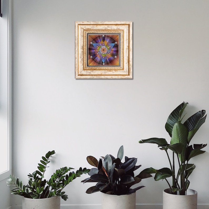 May include: A framed print of a colorful geometric design with a star shape in the center. The frame is gold with a white background.
