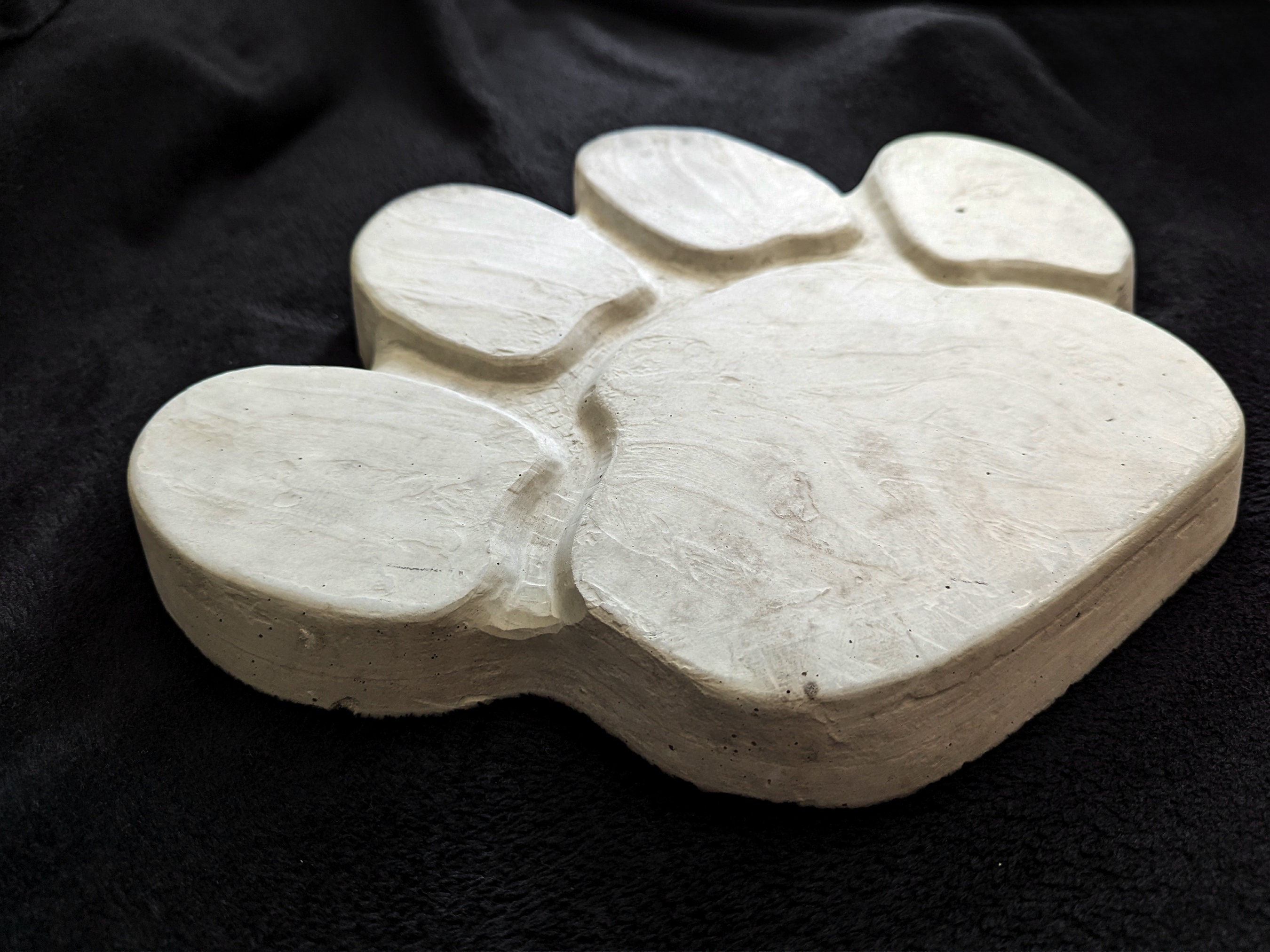 pack-of-2-paw-print-stepping-stones-durable-concrete-garden-ornaments