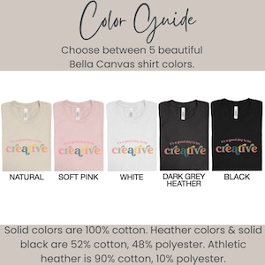 May include: Five Bella Canvas t-shirts in different colors: natural, soft pink, white, dark grey heather, and black. Each shirt features the text "It's a good day to be creative" in rainbow colors.