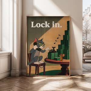 May include: A framed poster featuring a cartoon cat wearing sunglasses and using a rotary phone. The text "Lock in." is at the top. A stack of green money and a cartoon mouse are also depicted.