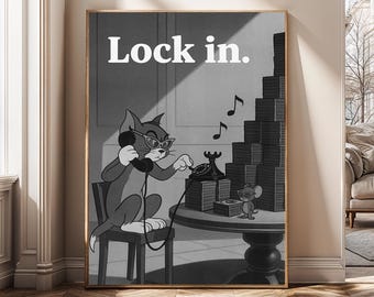 May include: Black and white framed print featuring Tom from Tom and Jerry wearing headphones and glasses, using a rotary phone. The text "Lock in." is at the top. Jerry the mouse is also present.