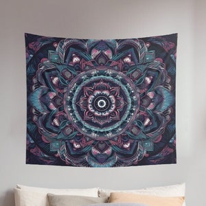May include: A tapestry featuring a large, intricate mandala design in shades of blue, purple, and pink. The mandala is surrounded by a dark background.