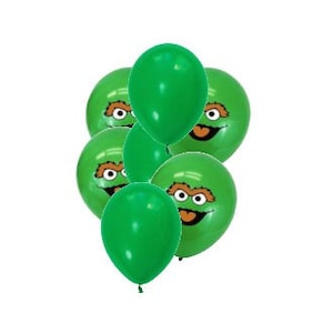 May include: A cluster of green balloons, some plain and others featuring a cartoon character's face. The balloons are a vibrant green color and are arranged against a white background. The cartoon character has a brown face and a smiling expression.