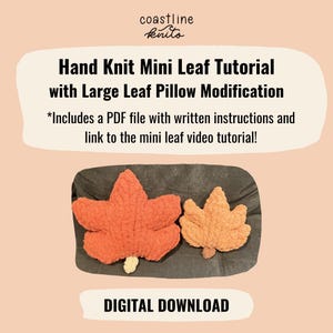 May include: A digital download for a Hand Knit Mini Leaf Tutorial with Large Leaf Pillow Modification by Coastline Knits. The image shows a large orange leaf-shaped pillow and a smaller light orange leaf-shaped pillow on a dark gray surface.