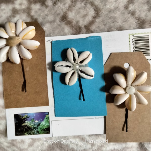 THREE COWRIE SHELL Flowers  with pearls on Bobby Pins. All Three of them are beautifully different looking flowers